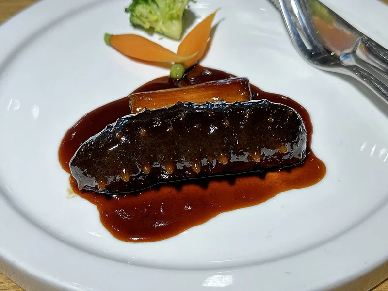 Grilled sea cucumber with green onion